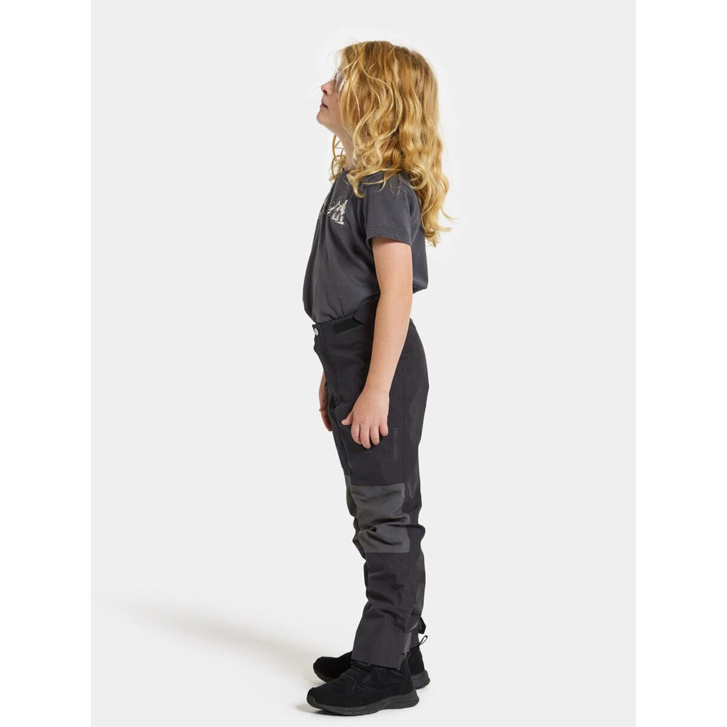 Didriksons Dětské nepromokavé kalhoty Svalört black - ROSTOUCÍ